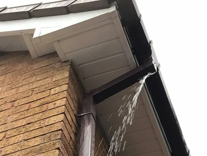 fix leaking gutter downpipe