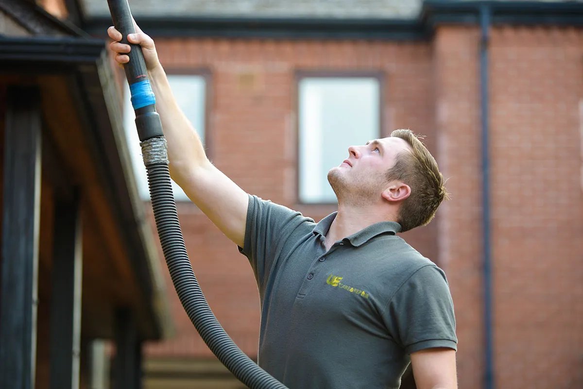 Gutter clearing handyman
