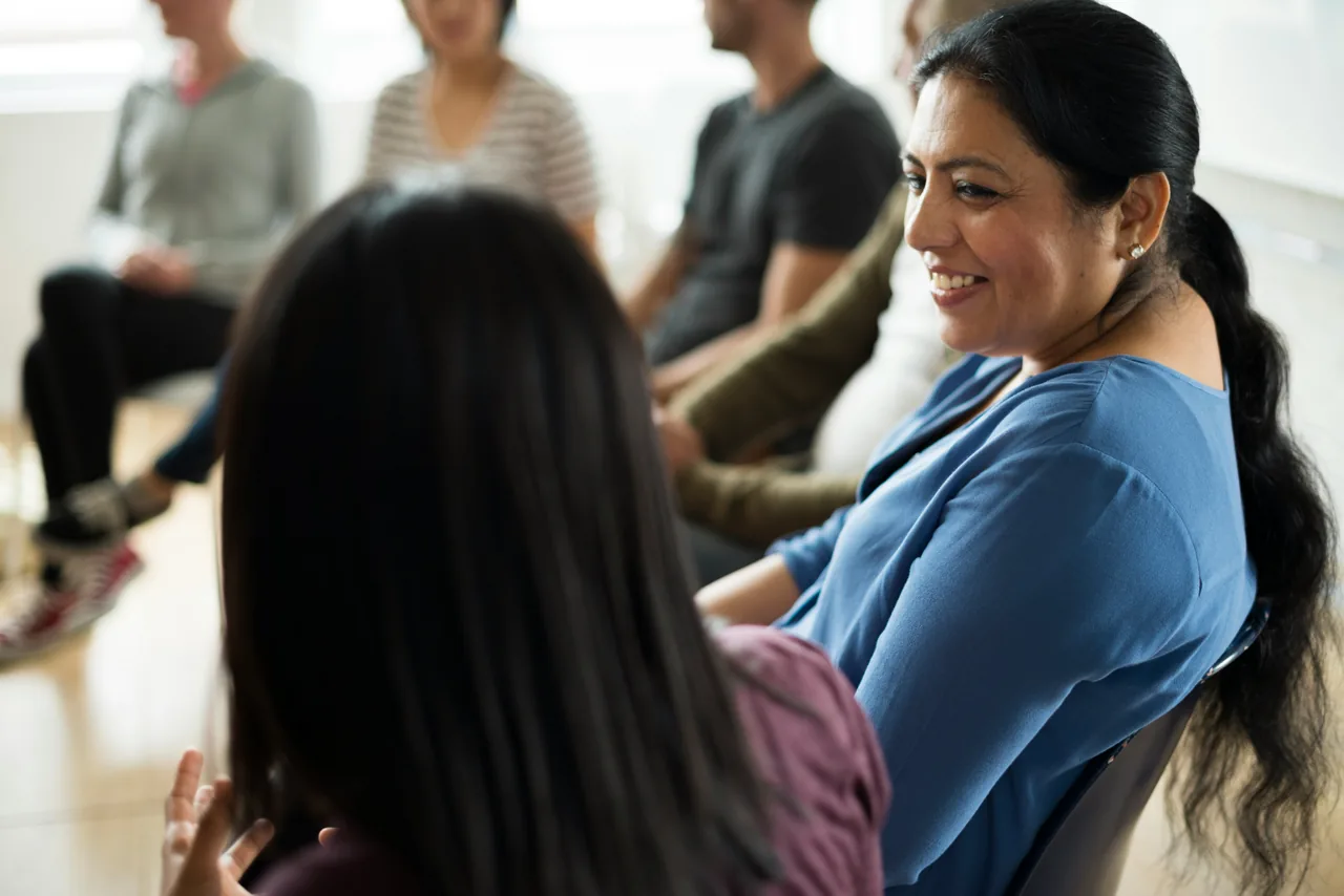 People taking part in a group discussion